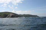 Costa occidental hacia el Sur desde Punta Pasante. Rompientes en la restinga de Pasante