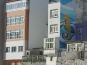 Puerto de Malpica. Mural de Urbano Lugrís