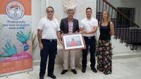 El director de Salvamento Marítimo recoge el reconocimiento de Málaga Acoge como Socio de Honor de la Asociación 
